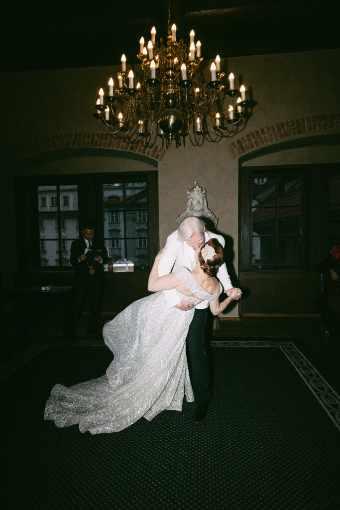 Couple during their wedding ceremony at the City Hall in Prague's Old Town Square.