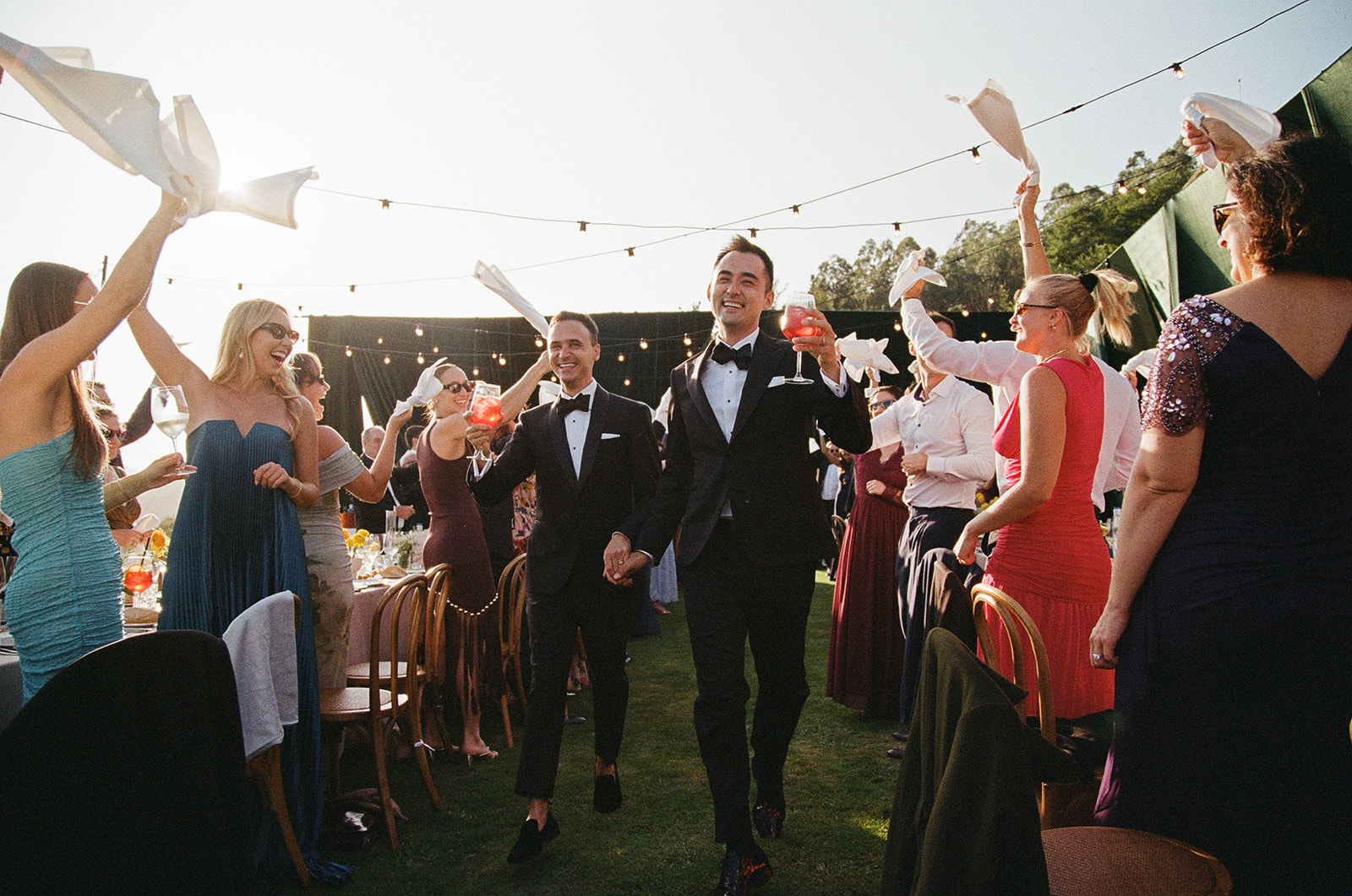 Two grooms celebrating on their wedding day in San Sebastian wedding captured by Lucie Muse