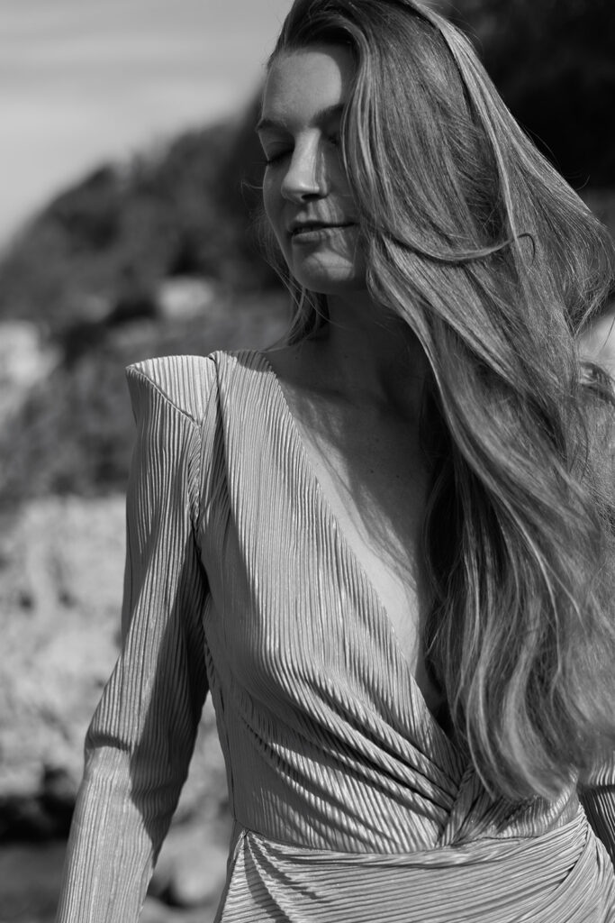 Dreamy bridal portrait in Mallorca – Sunkissed wedding photography in Spain – Artistic wedding photographer Europe capturing effortless elegance.