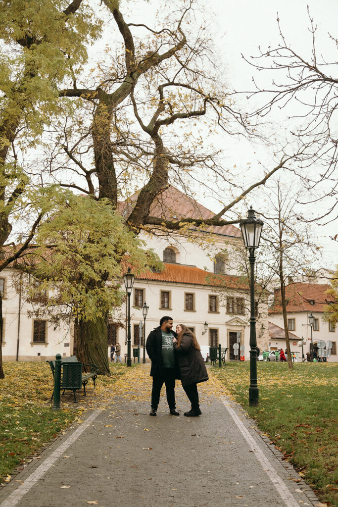 Authentic emotional reaction during a marriage proposal at Prague Castle