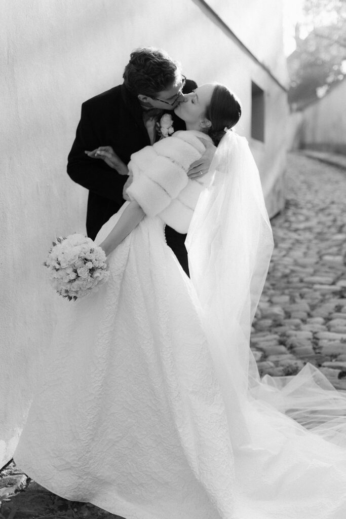 Intimate Prague elopement couple kissing – Artistic wedding photographer Europe – Romantic destination wedding session in the heart of Czech Republic.