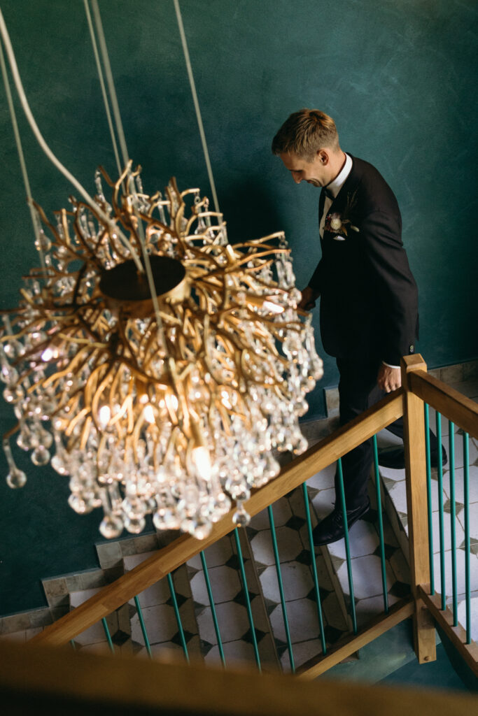 Sophisticated solo groom portrait in Mallorca – Artistic wedding photographer Europe – Modern black tie wedding style in Spain.